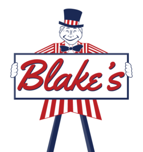 Blake's Lotaburger Mascot Holding Sign