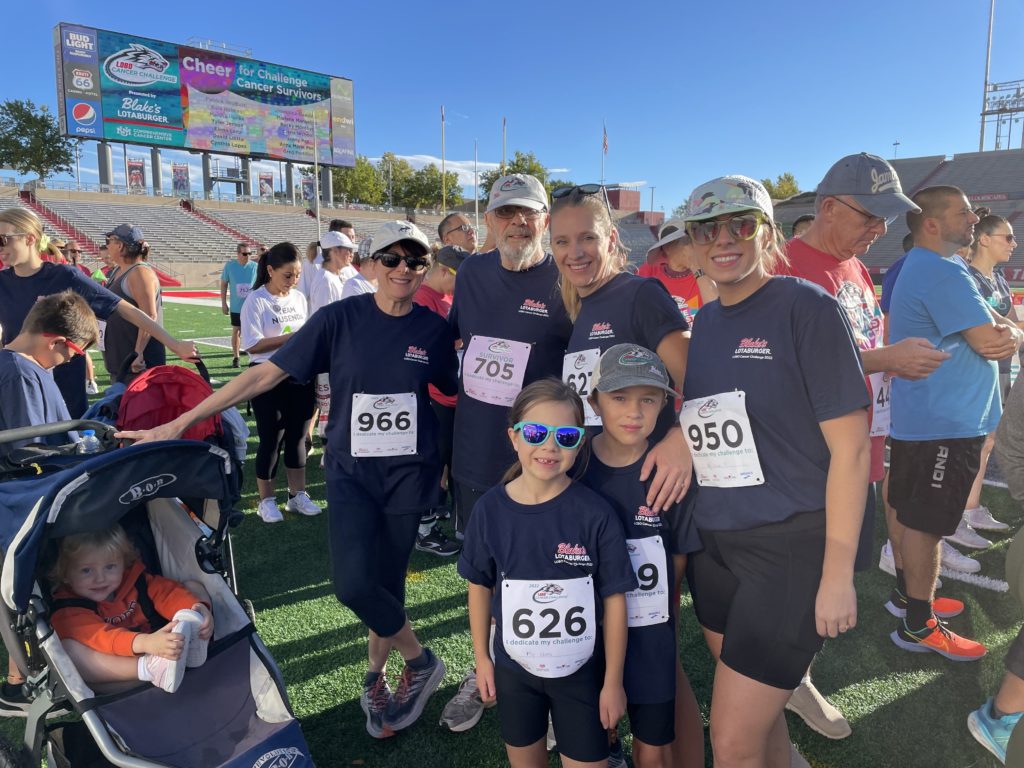 Photo of Blake's team members with their kids