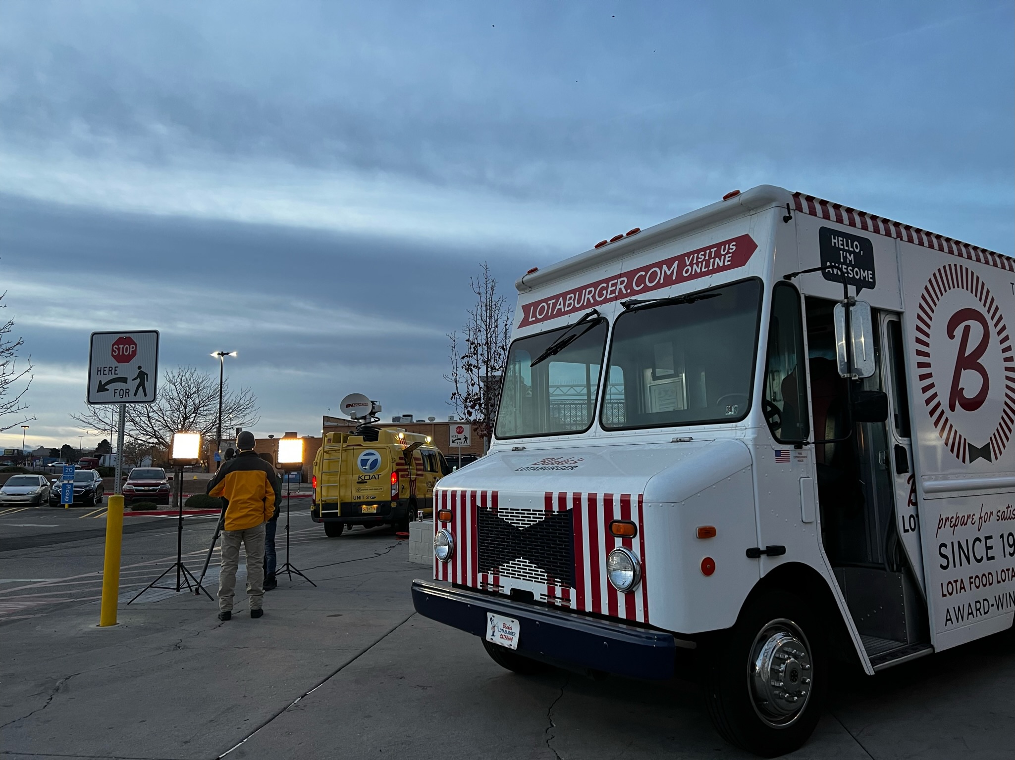 Blake's Lottaburger food truck in front of a channel 7 van