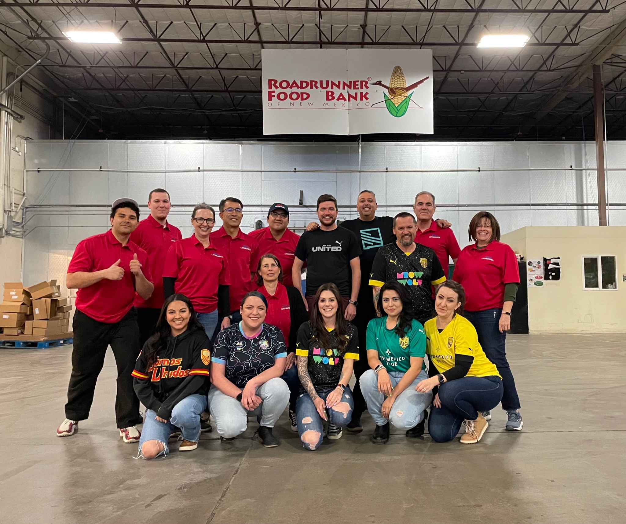 A group photo at Roadrunner Food Bank warehouse