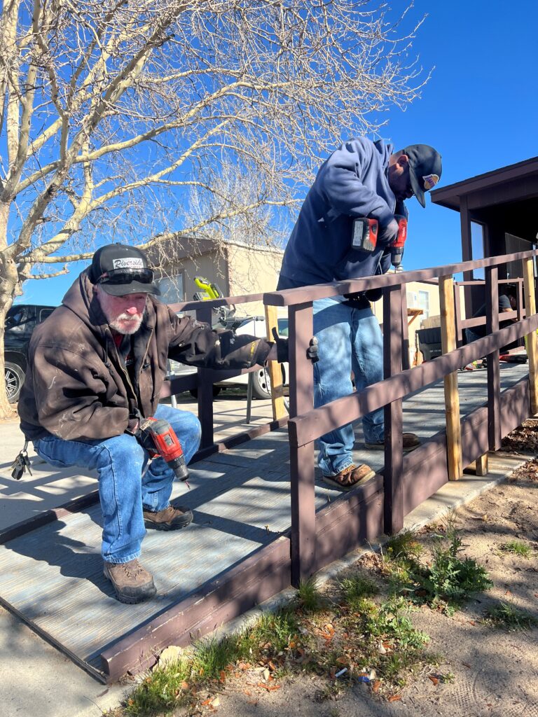 Blake's team member's working on hand railing