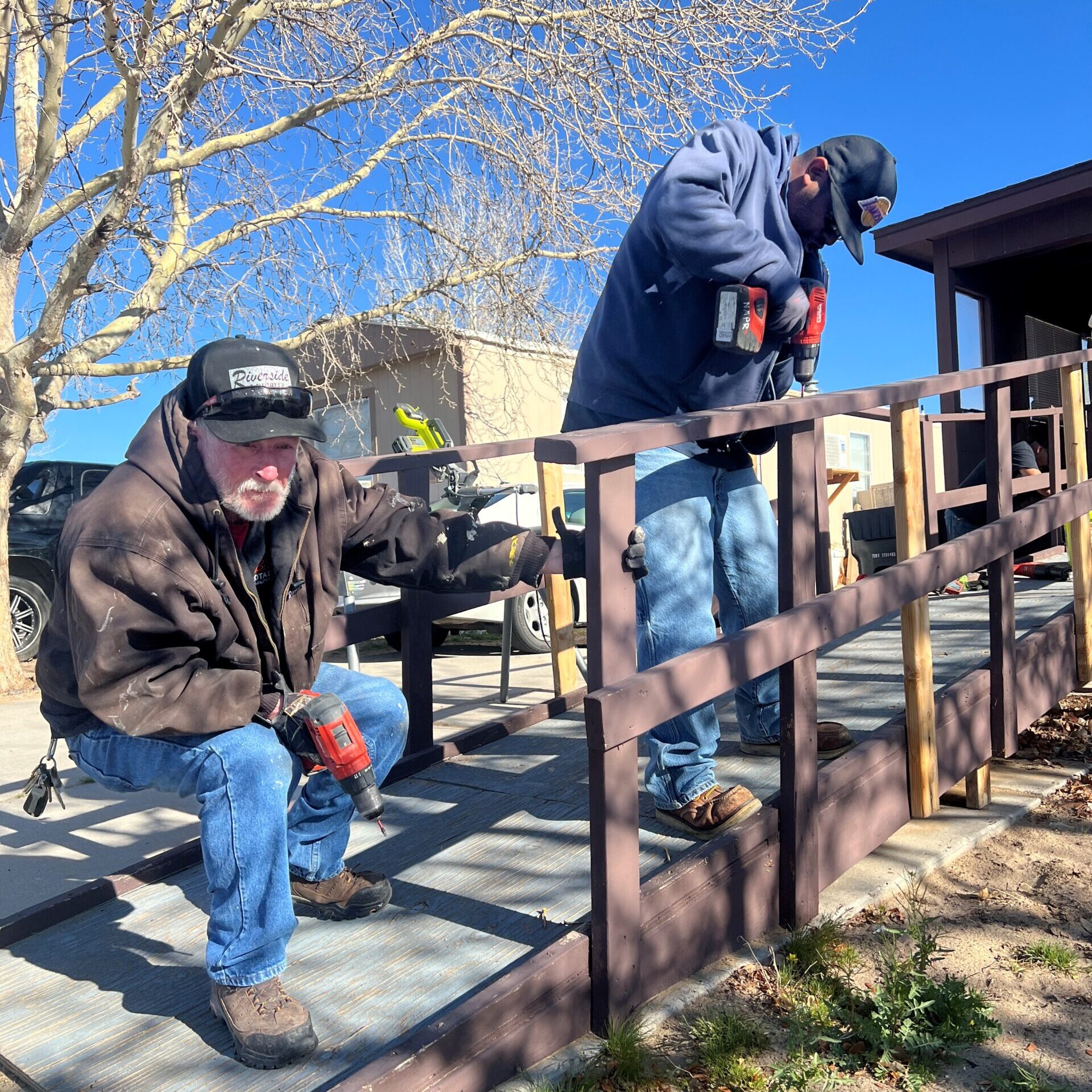 Blake's team member's working on hand railing