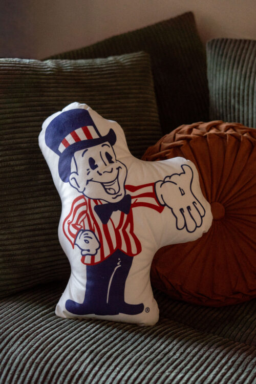 Blake man pillow sitting on a couch