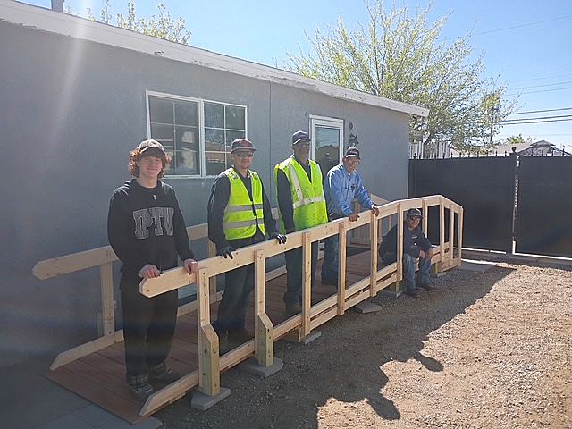 5 members of Blake's facilities team after building a new ramp.
