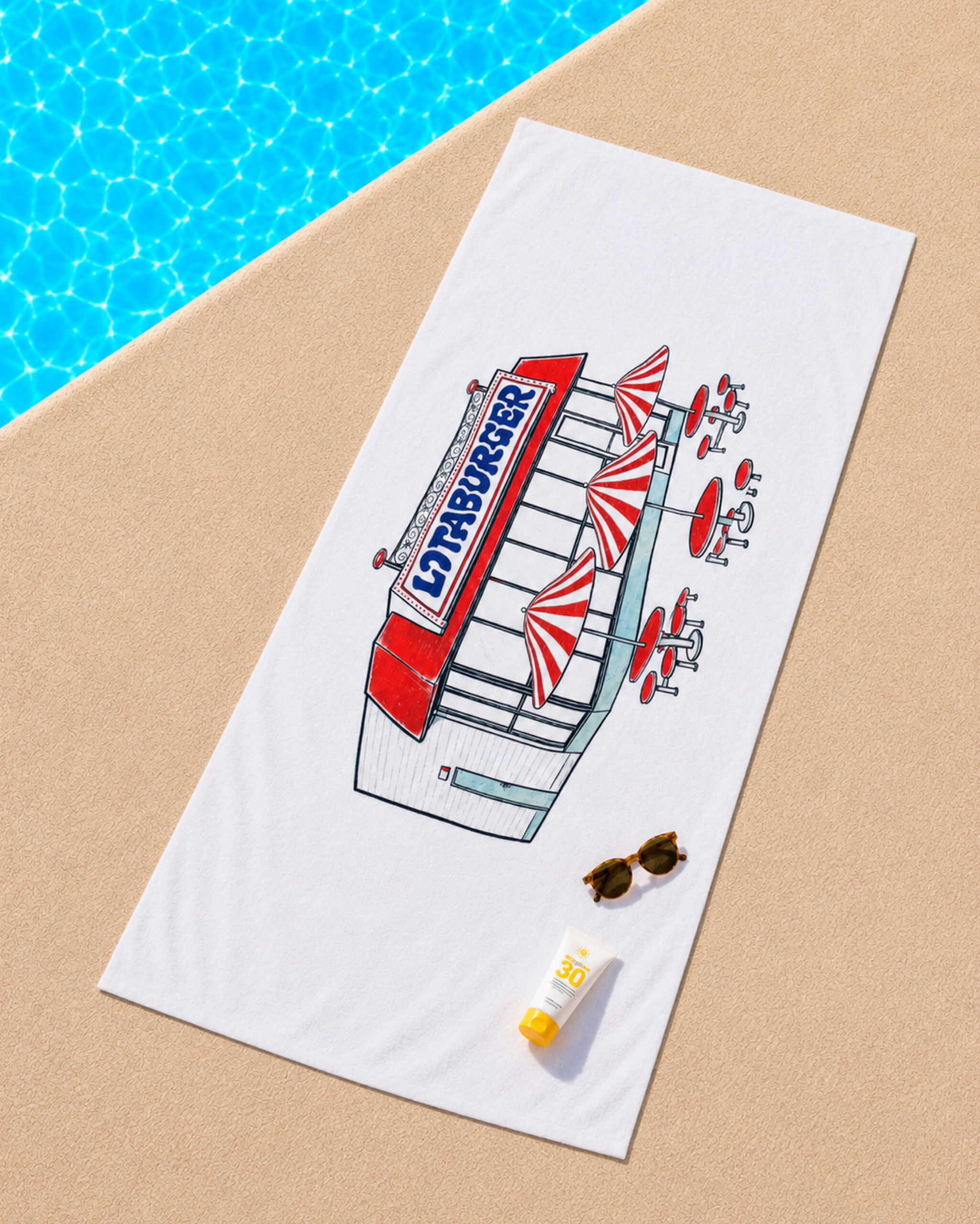 a white towel with an image of a classic Blakes lotaburger location on it